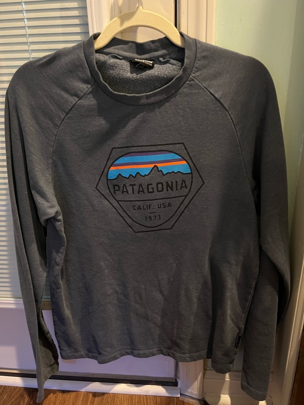 Patagonia Navy Tee with Multicolor Mountain Tag
